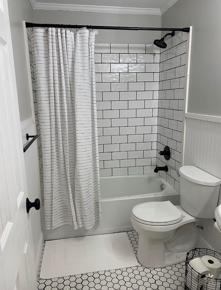 Beautiful tiled bathroom. 