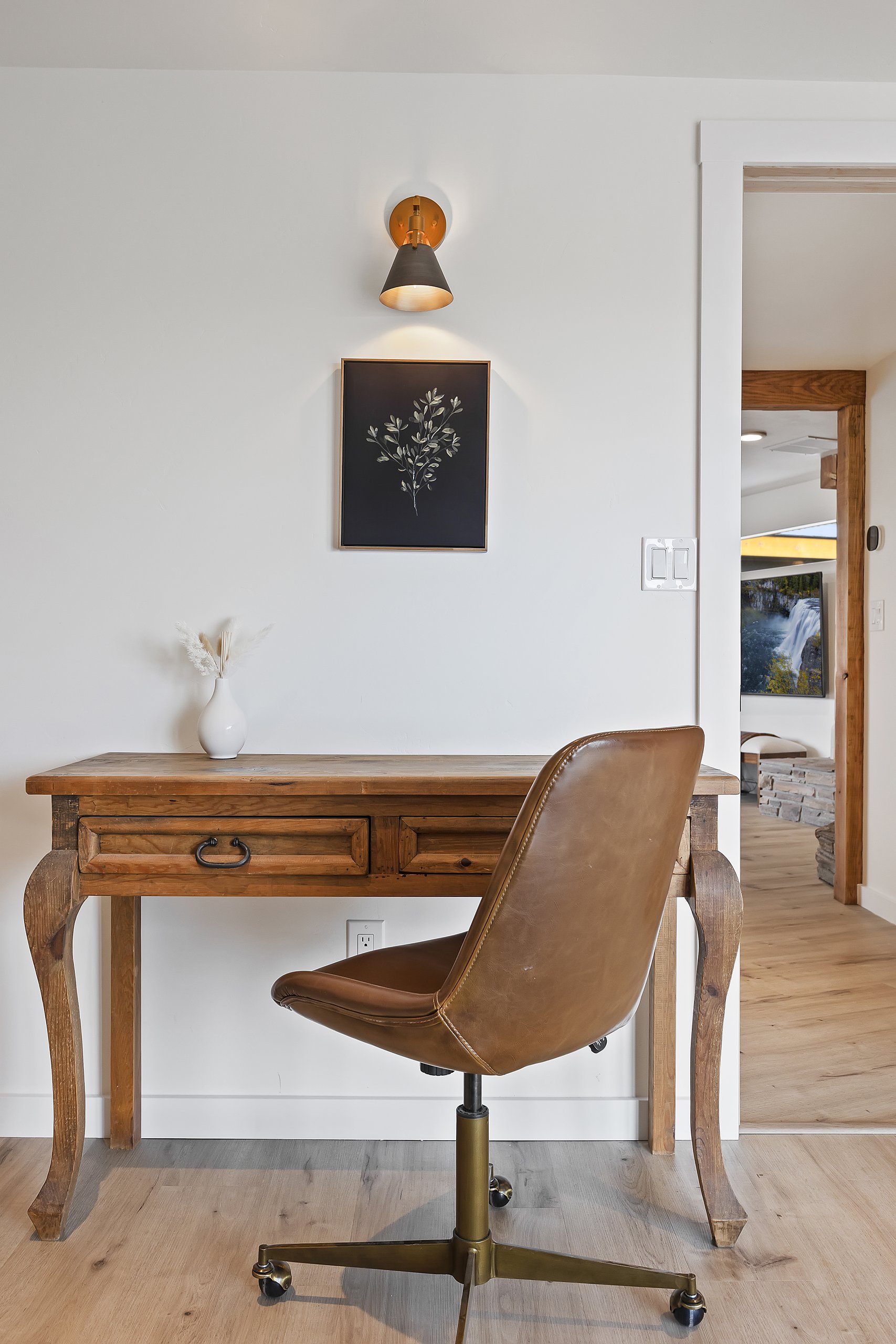 A quiet work-from-home desk tucked into the Cal King master