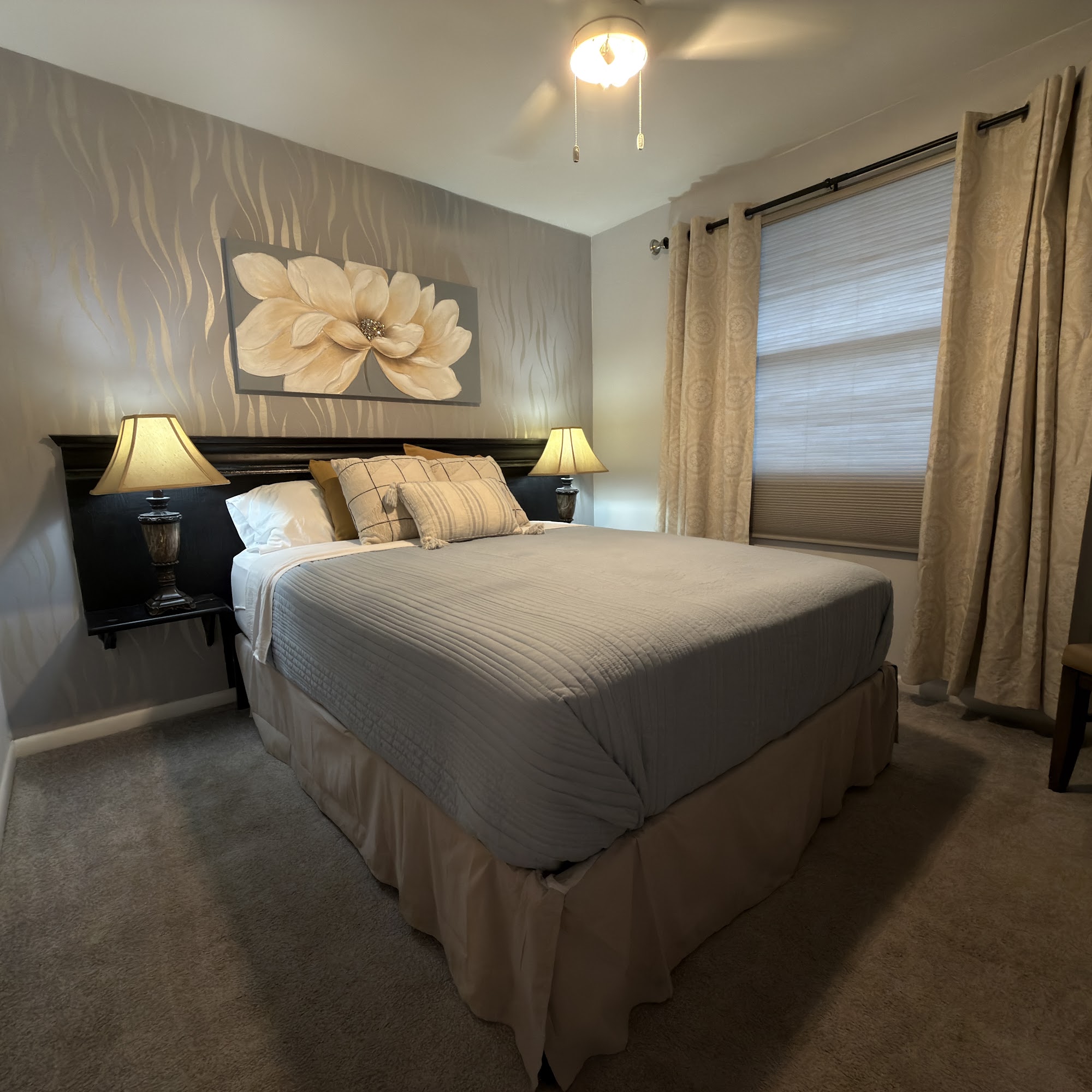 Bedroom 3: queen bed with magnolia art