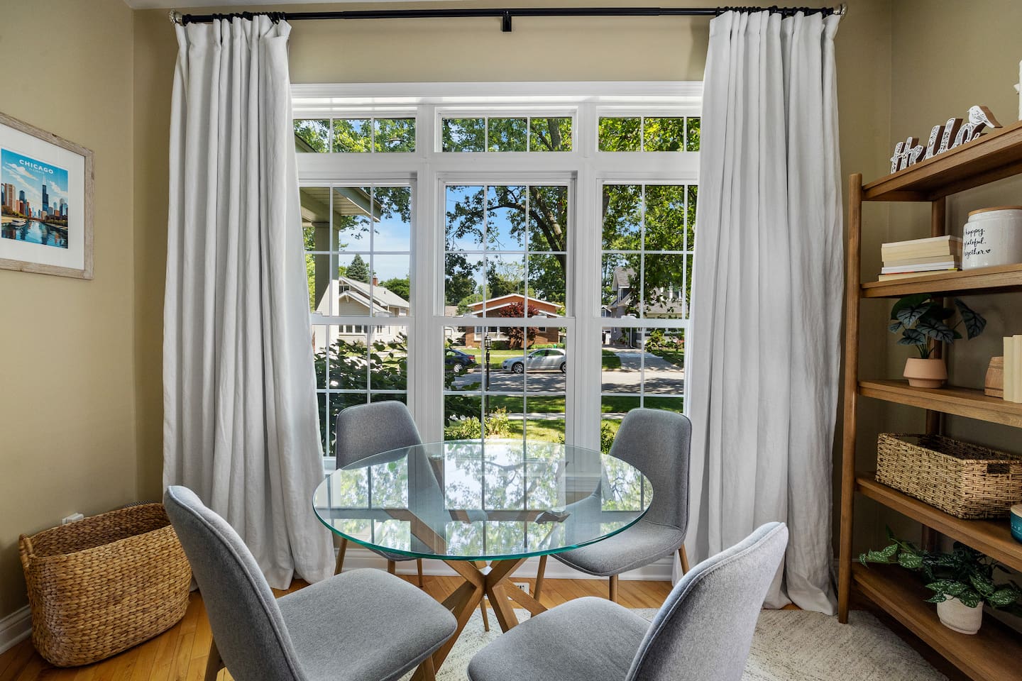 A game table with a view! Gorgeous shady views of the quiet Valpo neighborhood. This space is perfect for family to play some games and still feel part of the action with the open floor plan space.