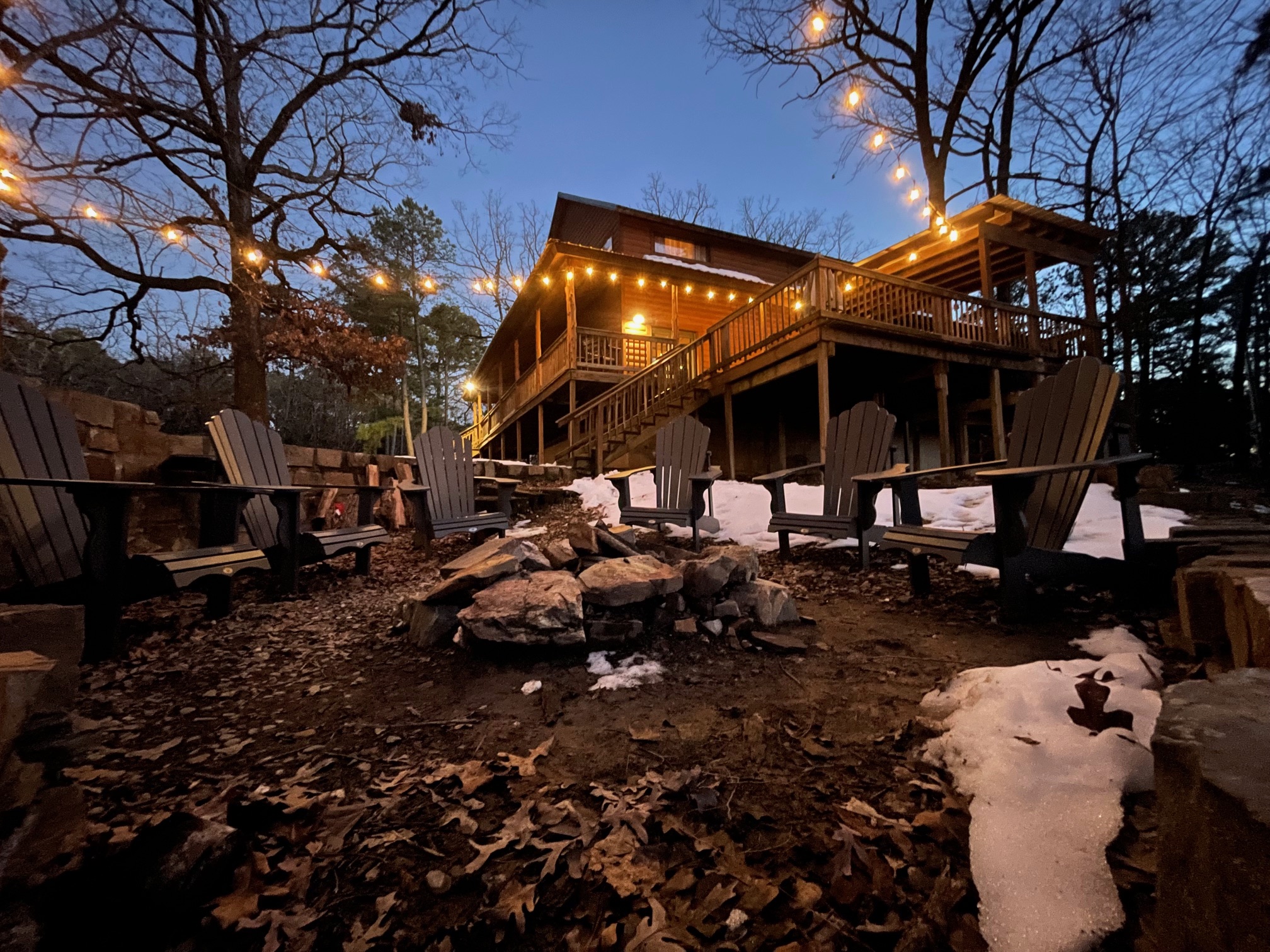 Fire Pit Area with String Lights and Seating