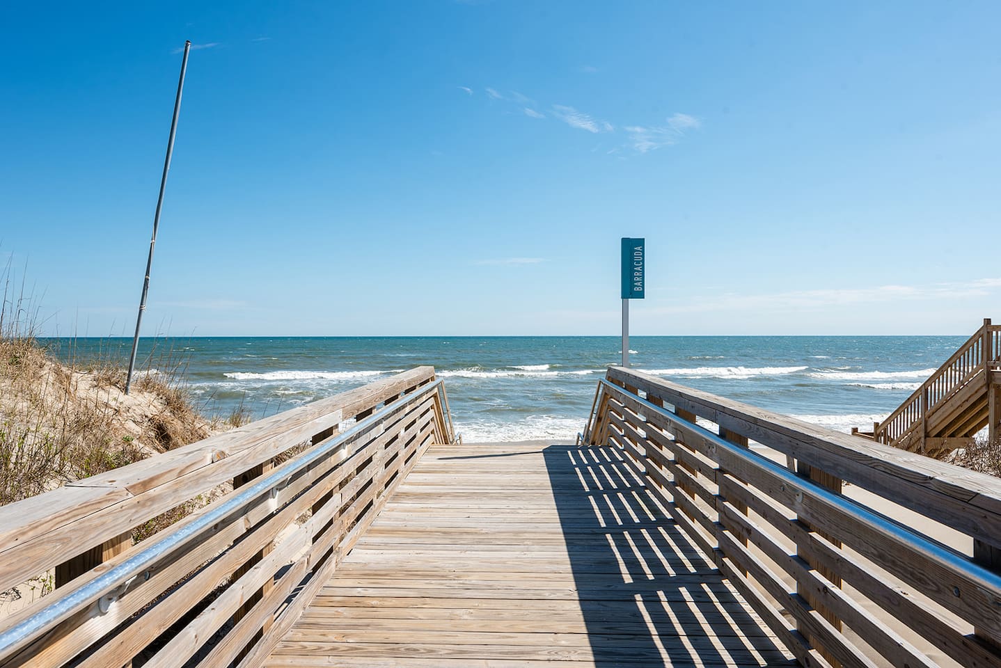 Private beach access walkway just steps from the ocean