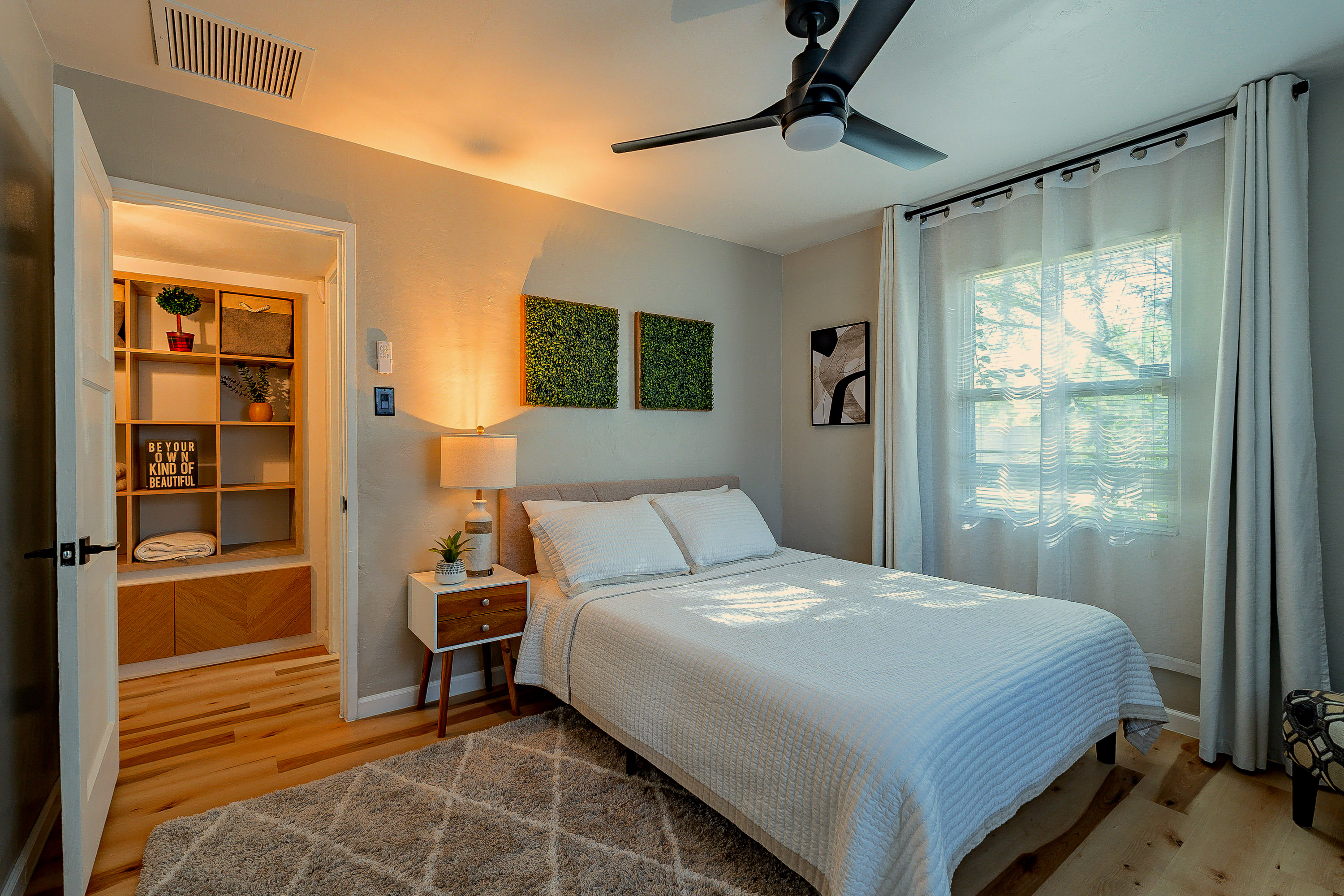 Bedroom Retreat: Enjoy tranquil sunlight and modern decor for a restful escape in Phoenix!