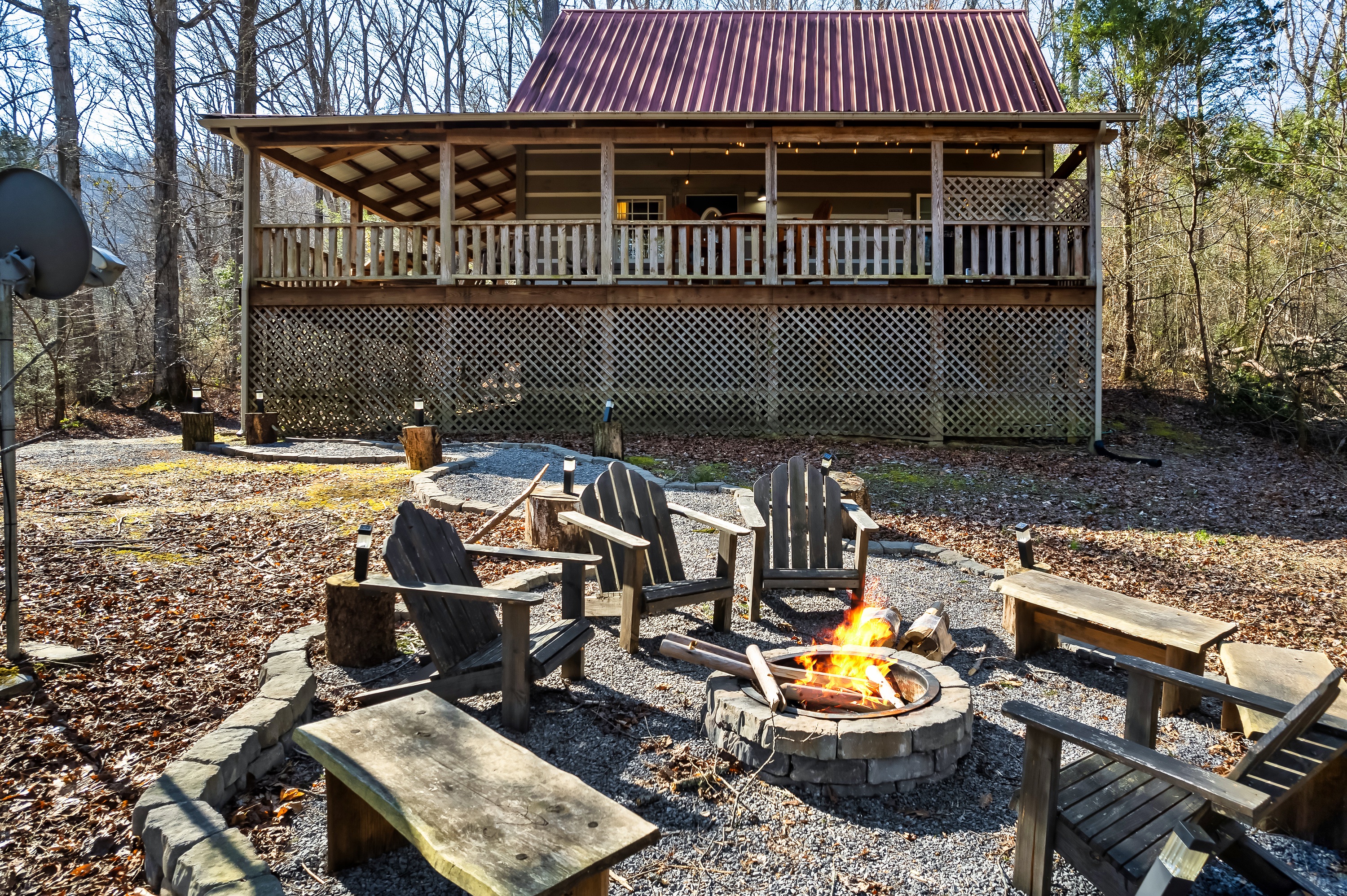 Gather around the flames under the trees