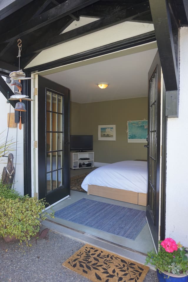 Private entry with door code for guest room downstairs.   French doors leading to the garden.