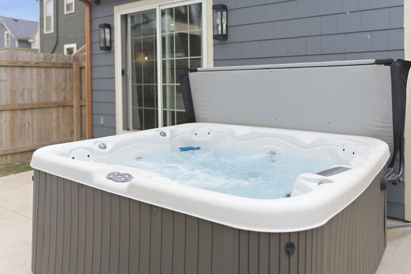 Spacious hot tub with relaxing jets, perfect for unwinding anytime