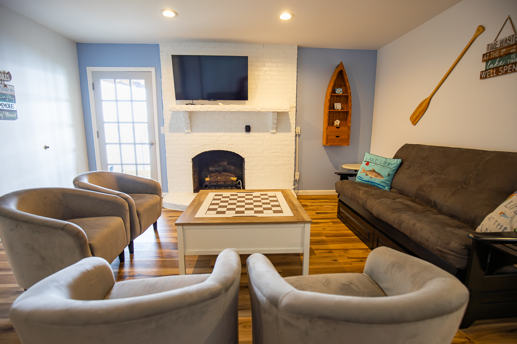 Game room checker/chess coffee table opens to reveal many more games, such as card games and Jenga