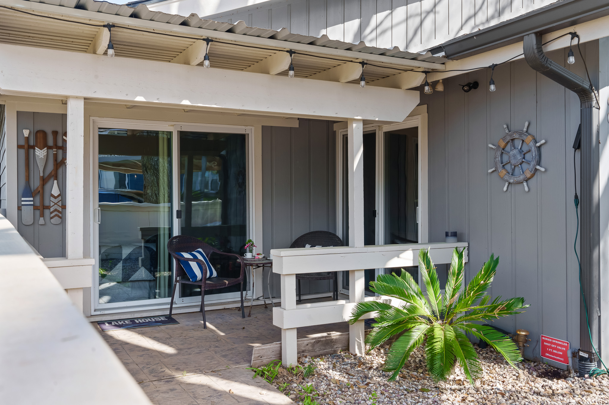 Need a quiet moment away from the lake day fun? This tucked-away patio just outside the master bedroom is the perfect little escape to relax, recharge, and enjoy a few peaceful minutes to yourself.