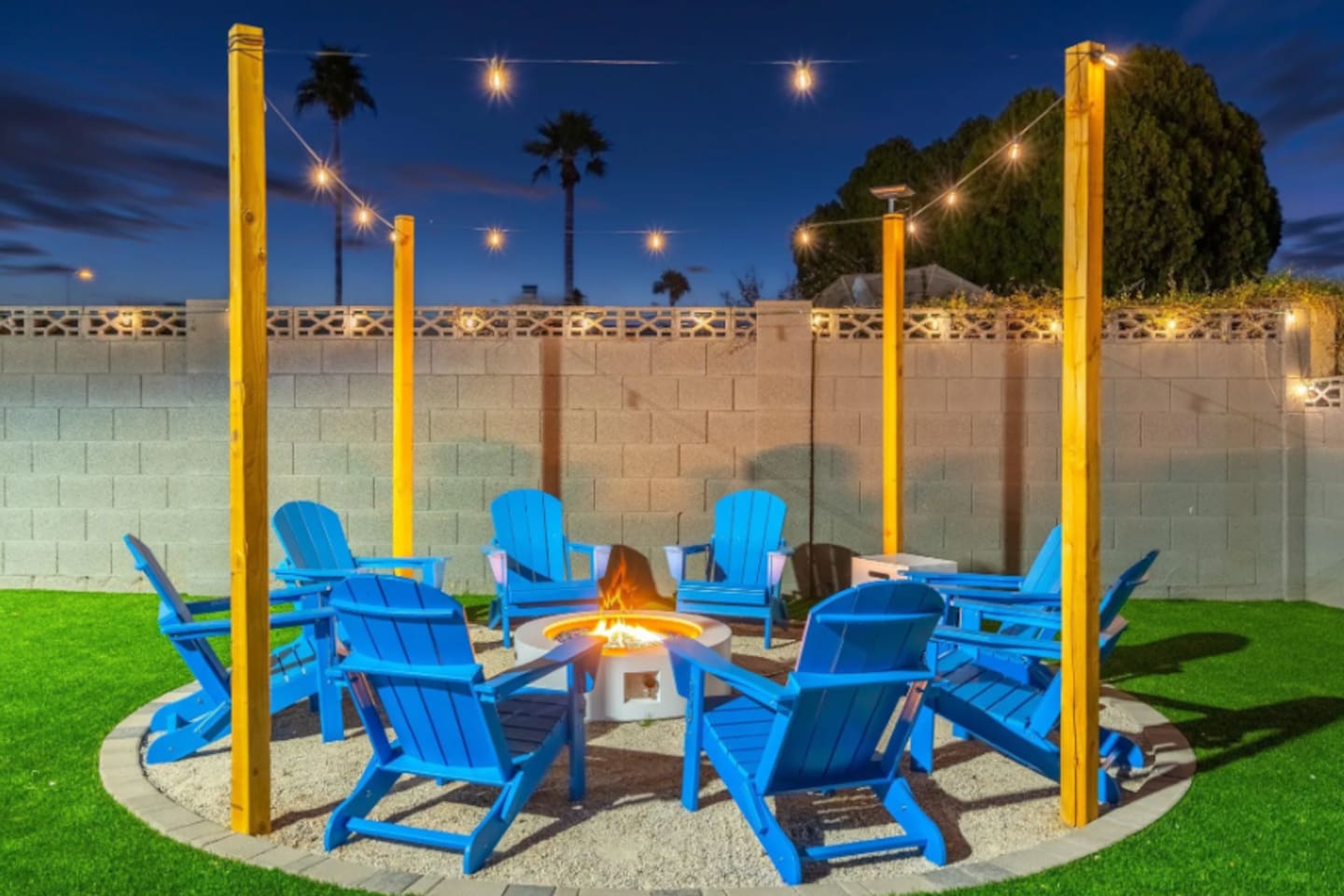 Twinkling string lights and a crackling fire pit make for the perfect nightcap to a full day of play.
