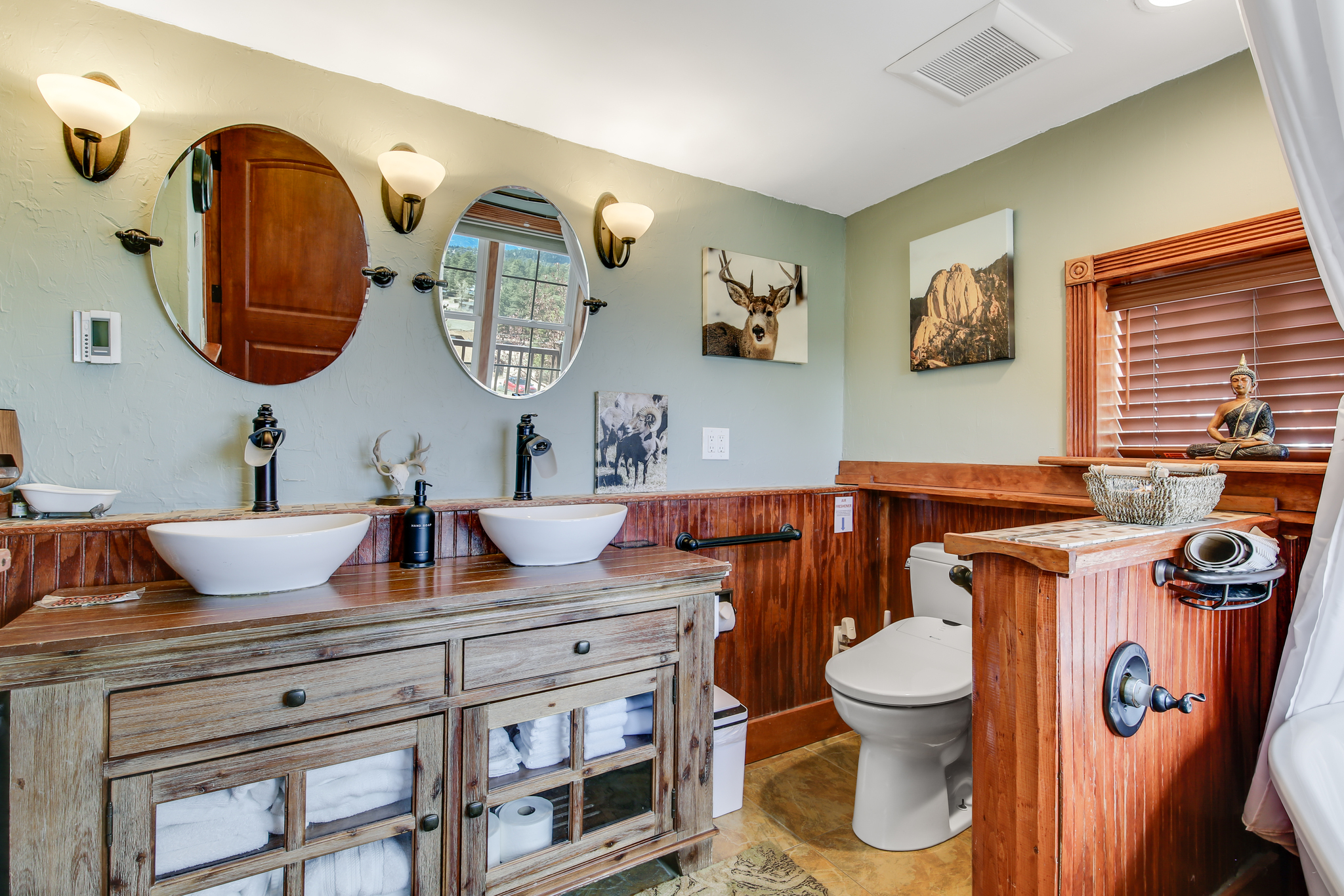 Spacious bathroom with double sinks and plenty of counter space.