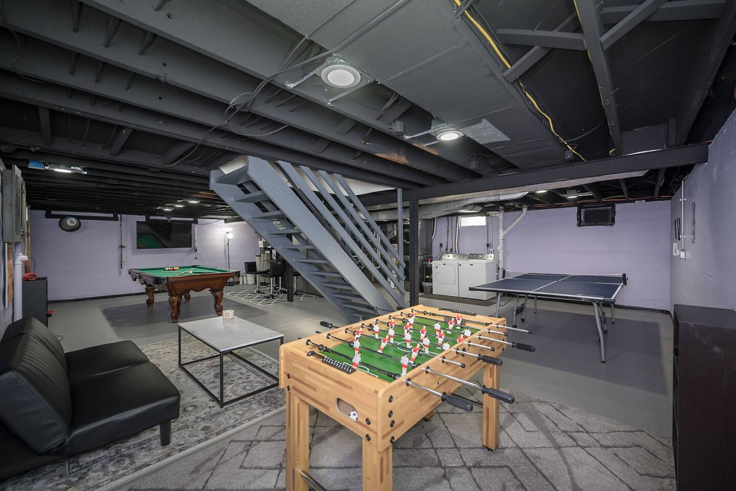 There's a place to sit on the futon and a foosball table