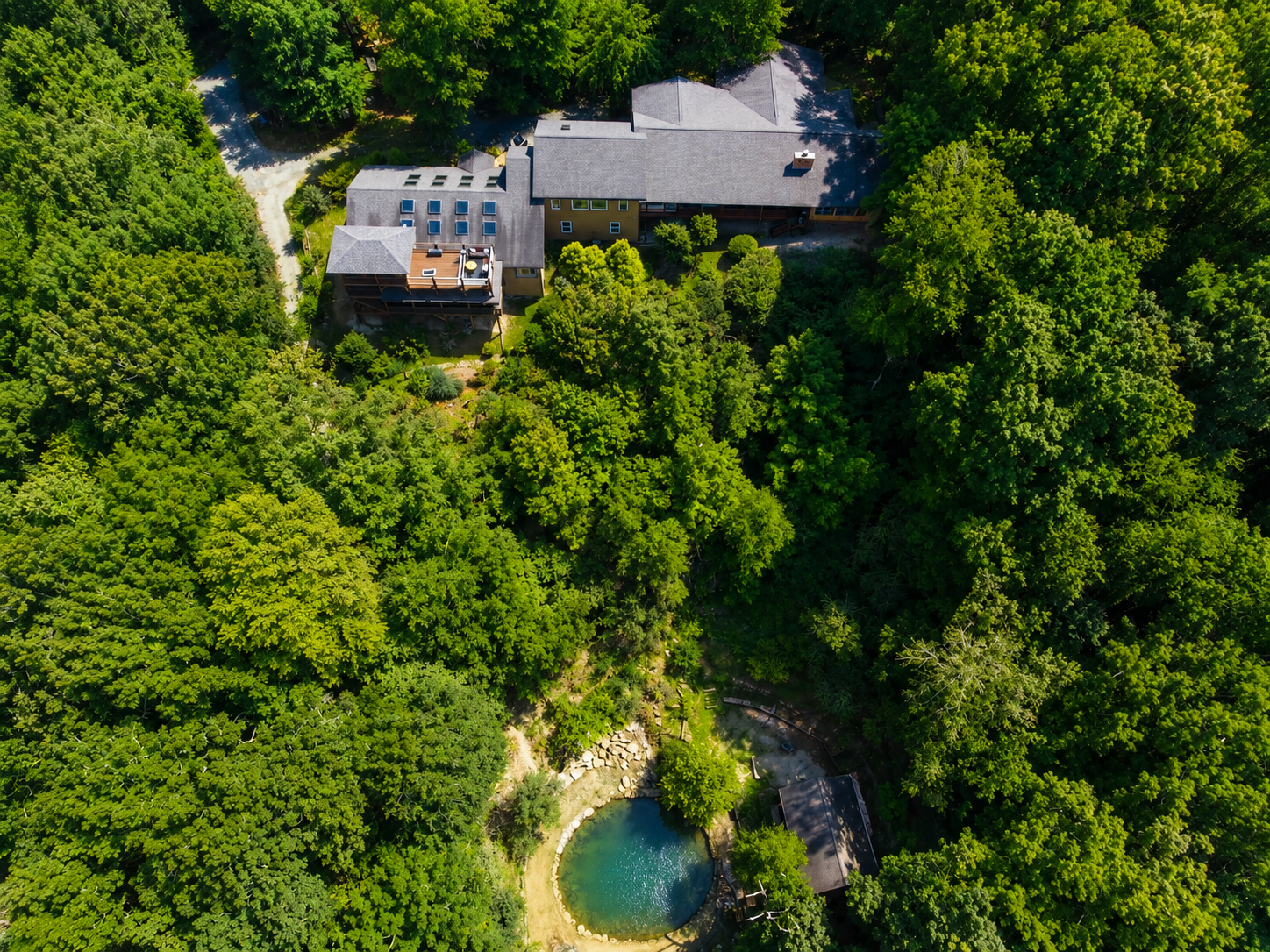 {Private Forest Resort} Tucked into the Blue Ridge Mountains with expansive decks, wooded trails, and a hidden trail to the pond and caboose.