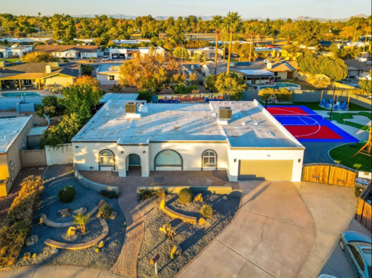 A classic Southwest facade with desert landscaping out front — a quiet first impression before the backyard steals the show.