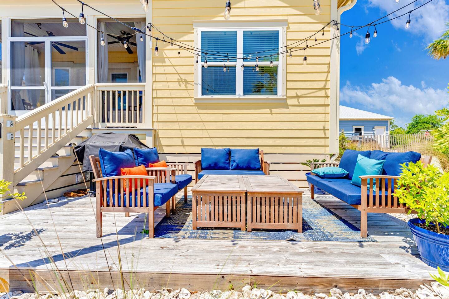 Enjoy morning coffee with this outdoor seating, afternoon sunshine, or evening conversations with outdoor lights