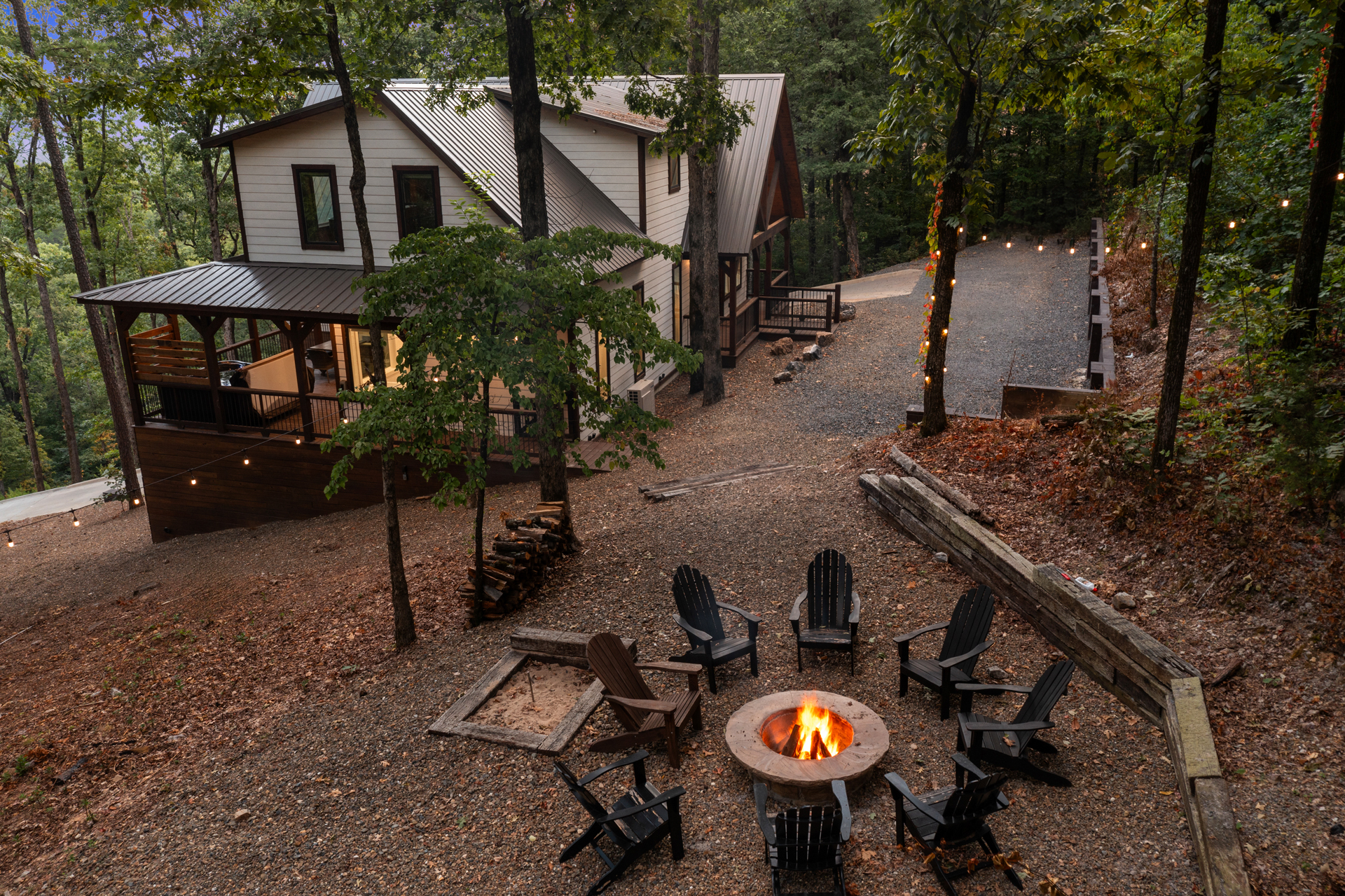 Private fire pit area surrounded by peaceful forest scenery 