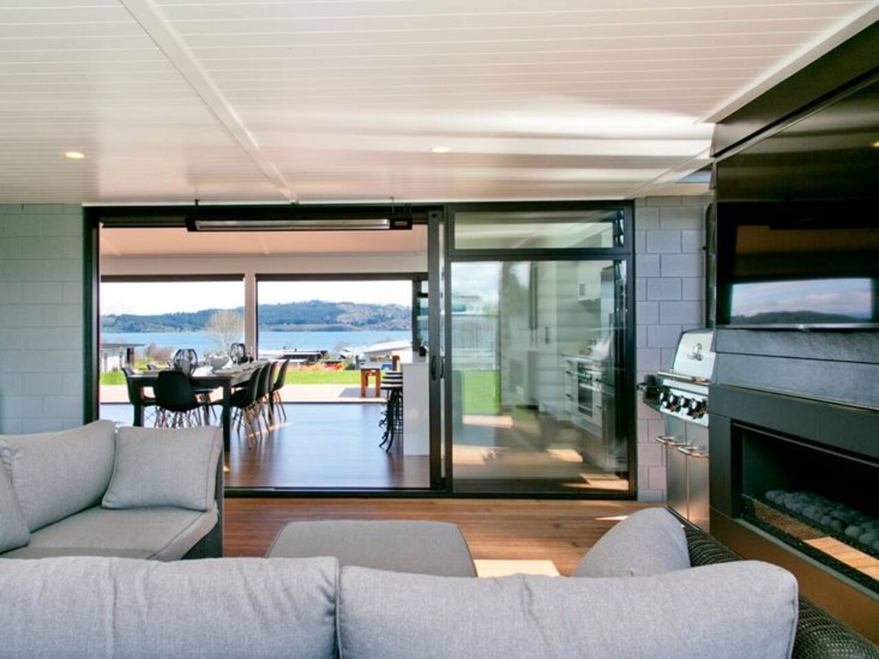 Covered Outside entrainment with look through views to the lake and beyond 