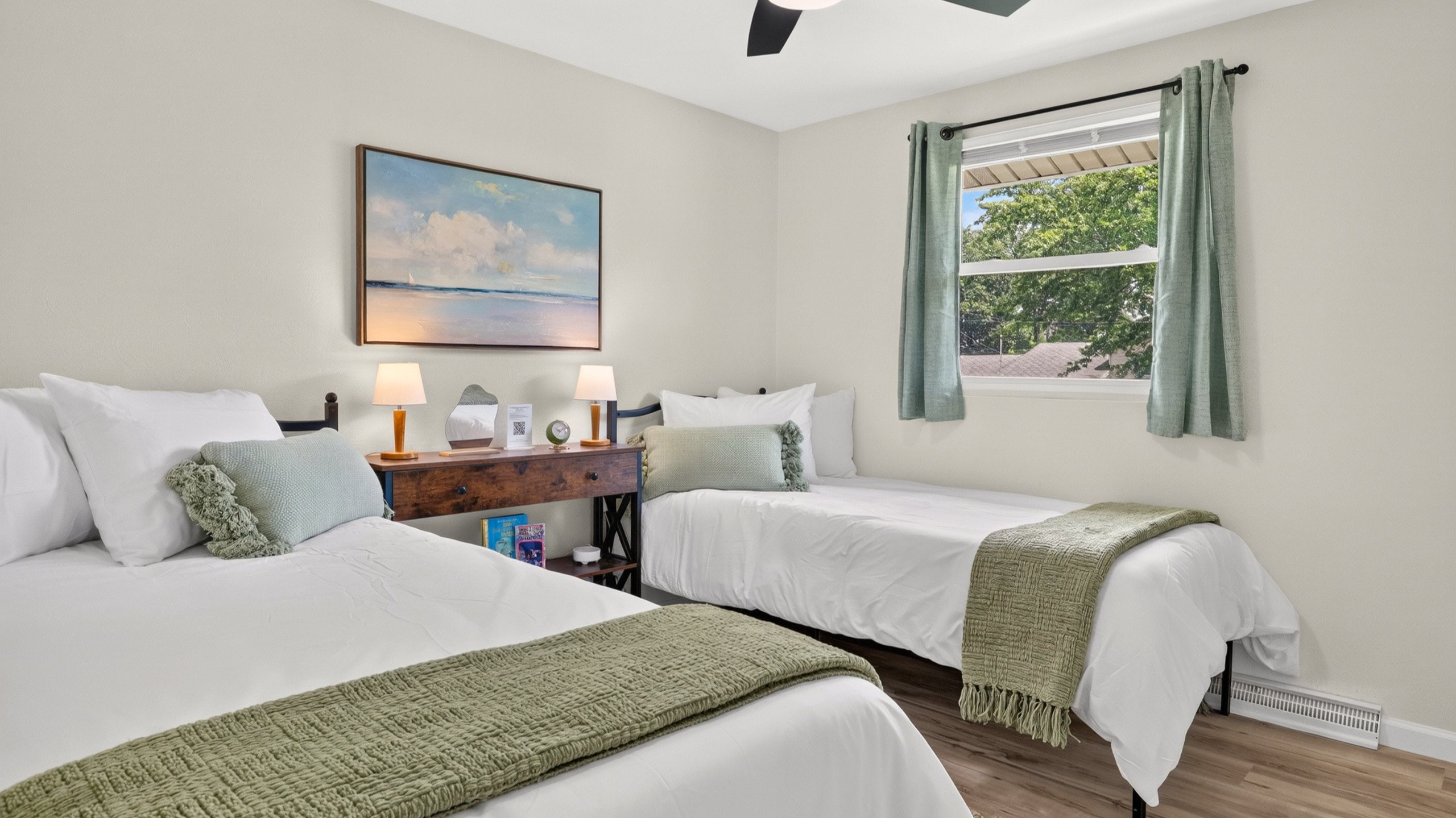 Second bedroom with two comfortable XL Twin beds—great for families or work crews.