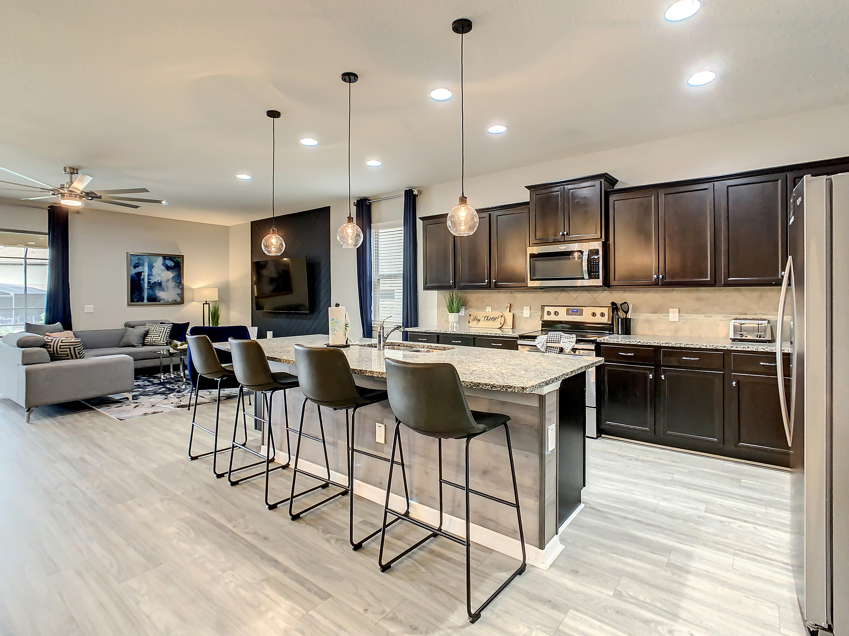 Breakfast Bar And Full Modern Kitchen