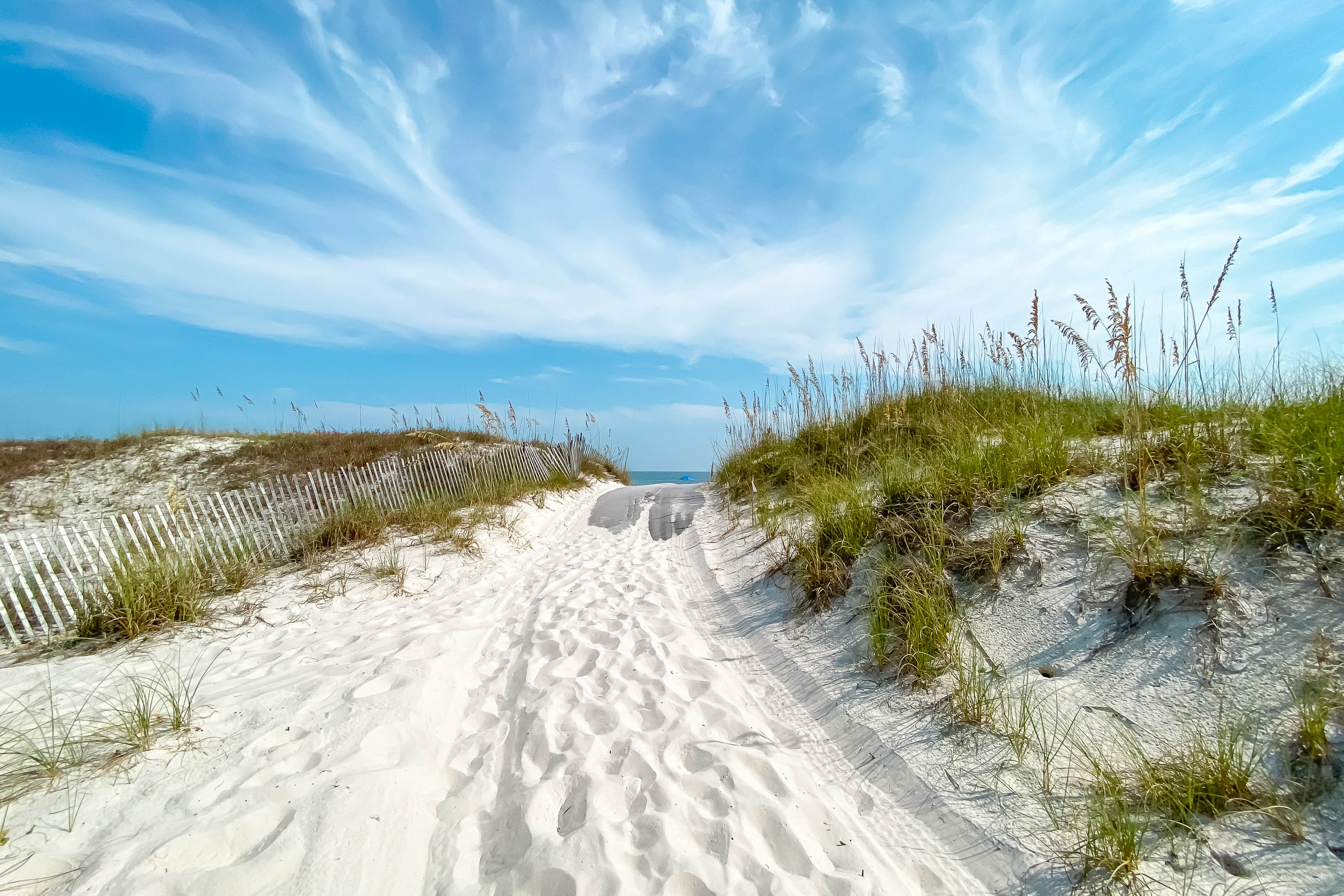 Follow the path to sun and sand. This is the Bella Luna deeded beach access, your direct route to the pristine Gulf Coast.