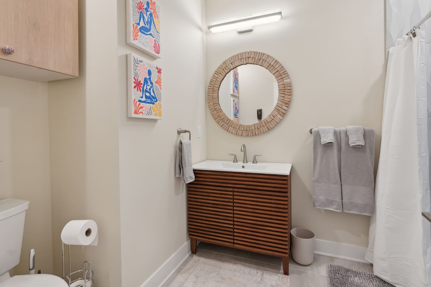 Full Bathroom with step-in shower. Washer and dryer in this space as well. 