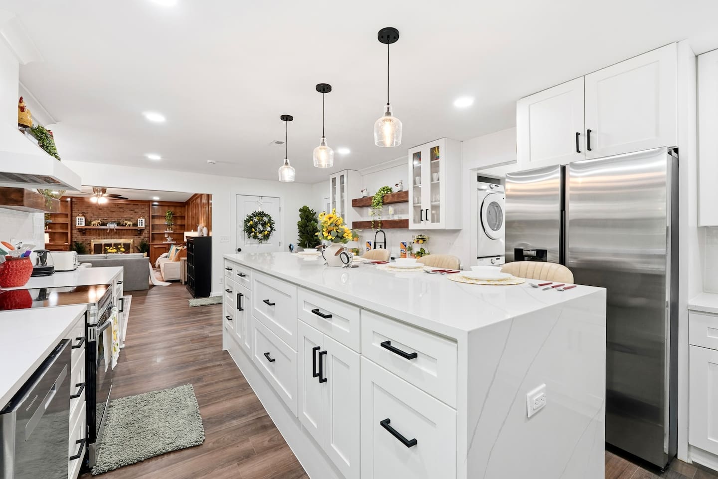 Beautiful white kitchen fully equipped with all the appliances and essentials of a home away from home.
