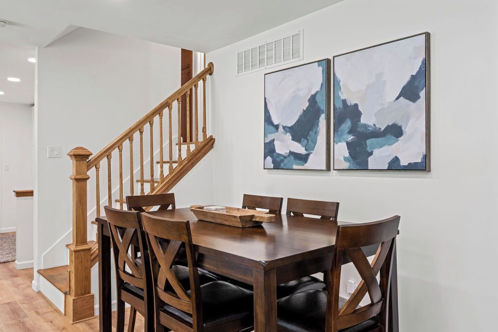 Gather around the formal dining table for a meal with friends & family