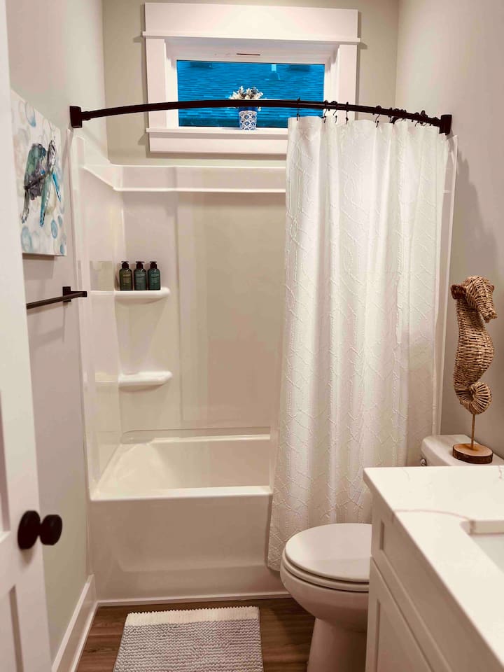 Hall Bath which is accessible from Bedroom 2 as well.