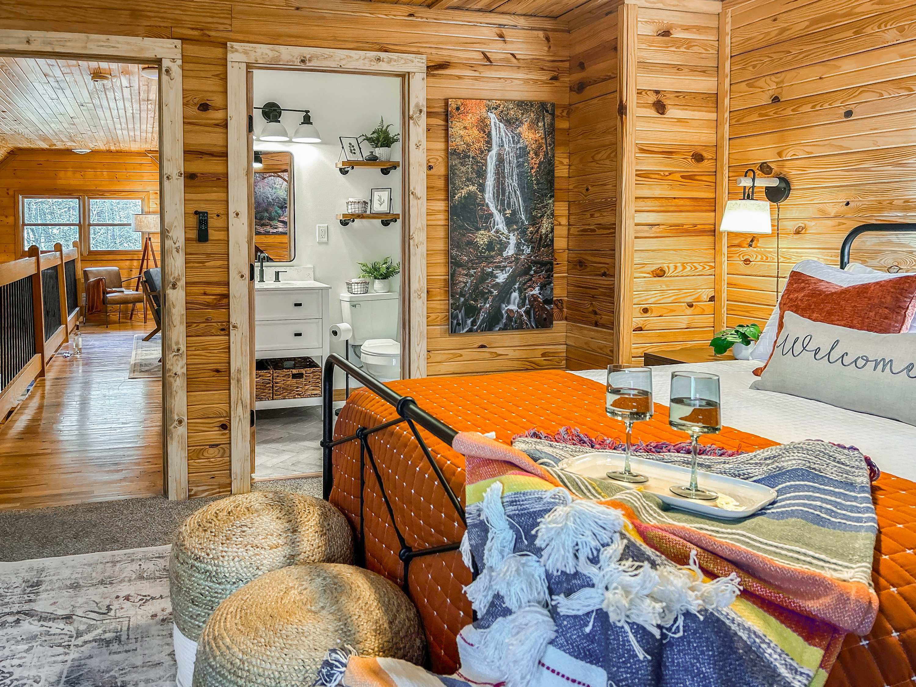The queen bed is comfortable and there are outlets on either side of the bed.