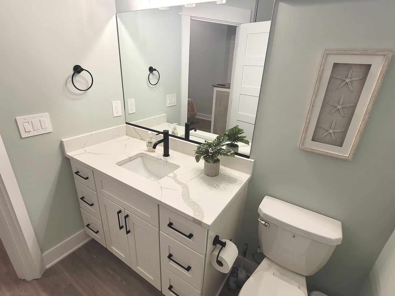 Bright master bathroom.