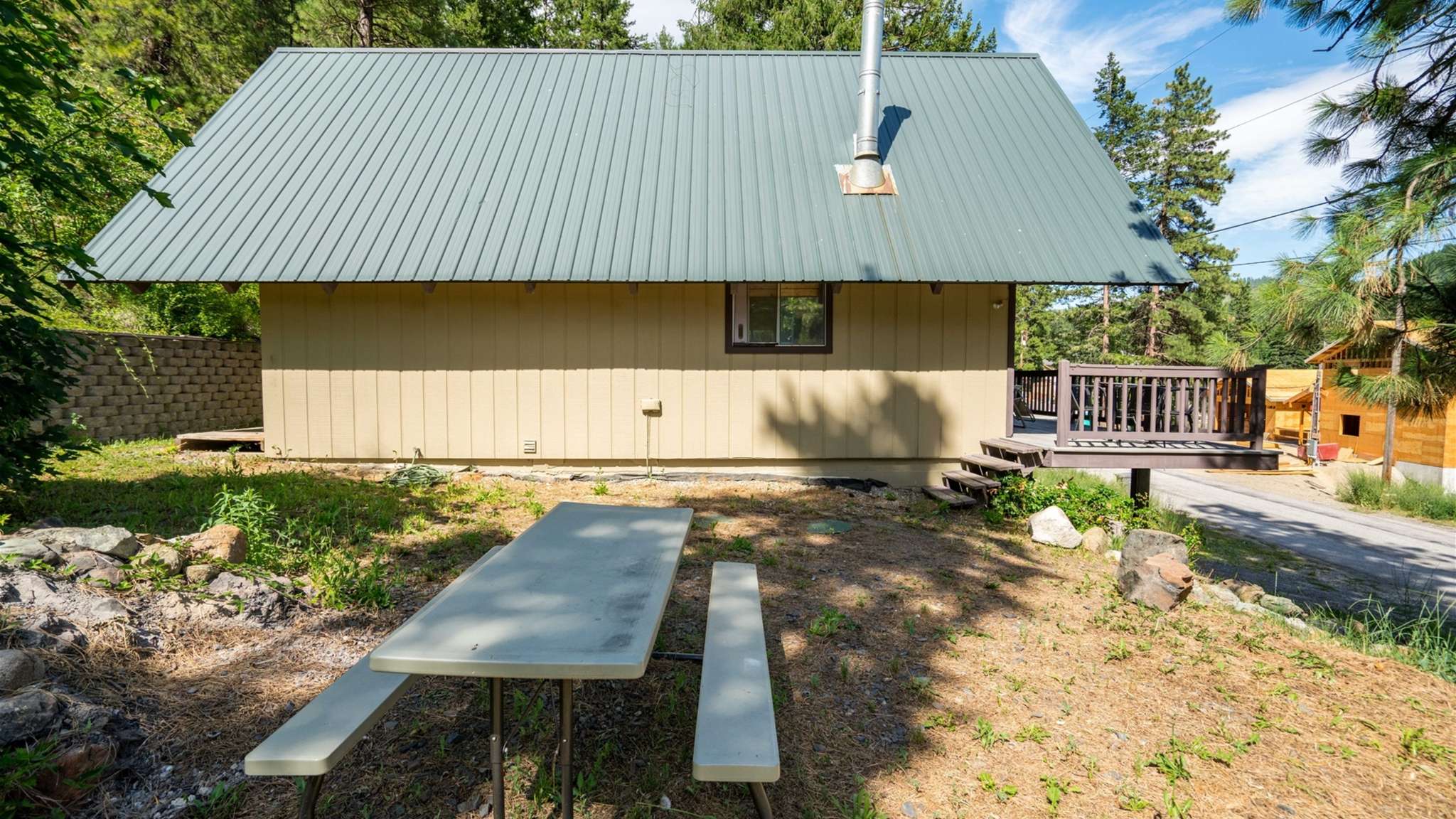 Side yard area with easy access and plenty of space for outdoor play.