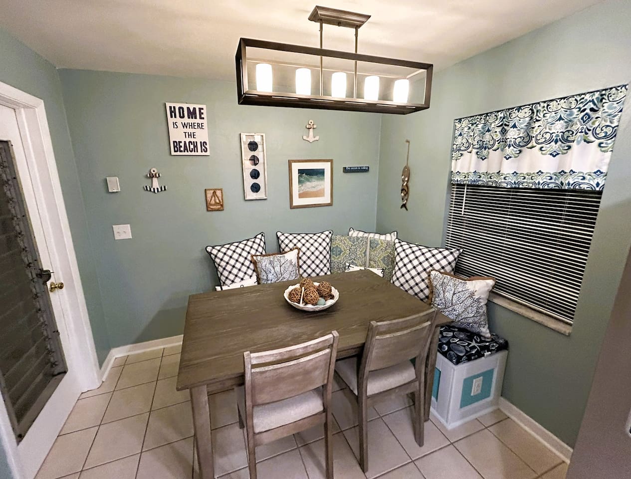 Breakfast Nook/Work Station/Multi-use space. Sit on the comfortable, padded bench or chairs and enjoy a cup of coffee while catching up on emails or other work. USB Plugs located on both sides of bench to charge laptops, phones, tablets etc.