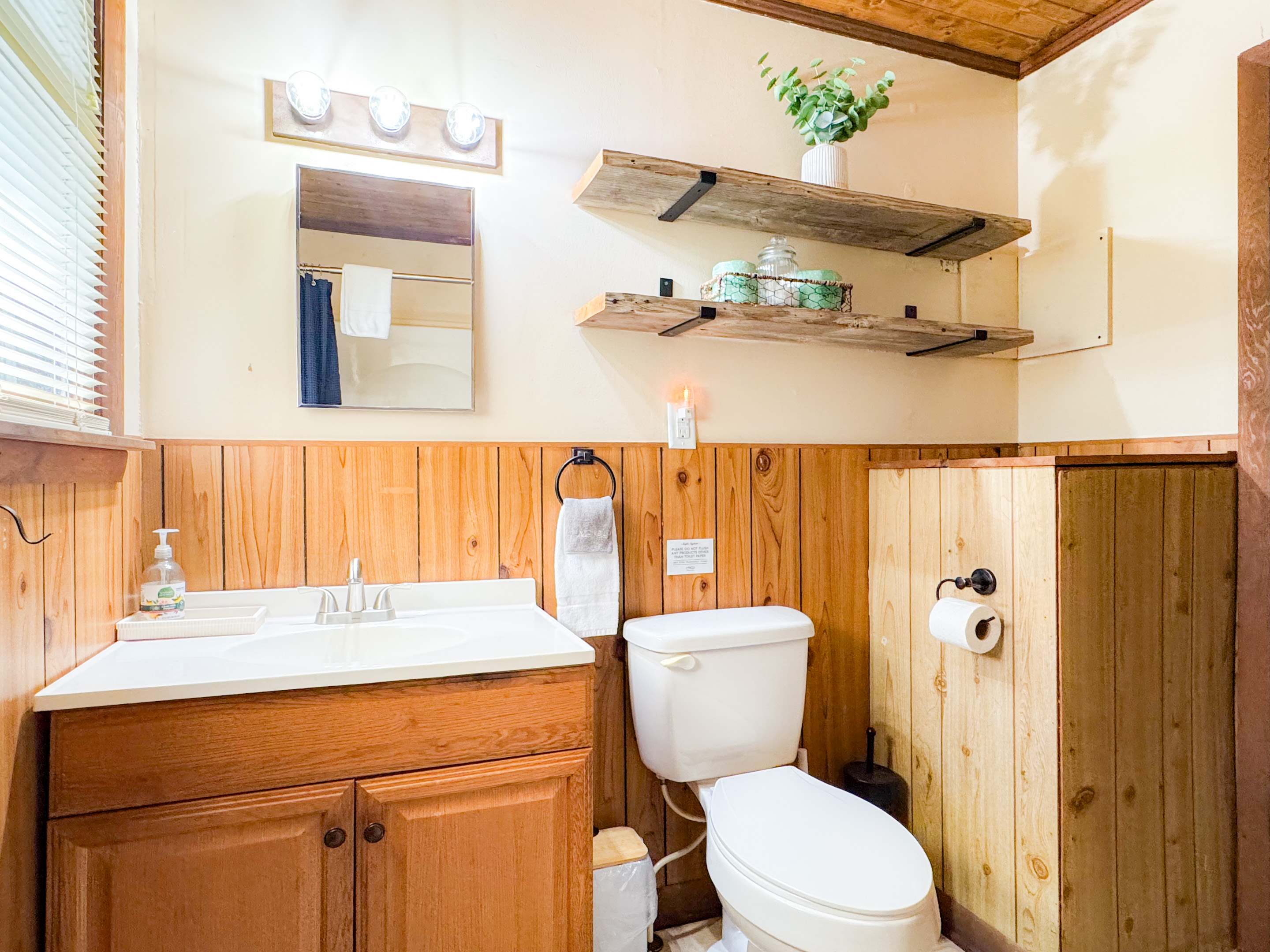 The main level bathroom is small but efficient. The full bathroom includes a standup shower. 