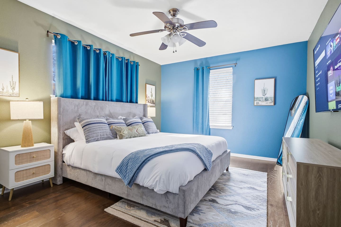 First-floor bedroom with king bed and Roku TV