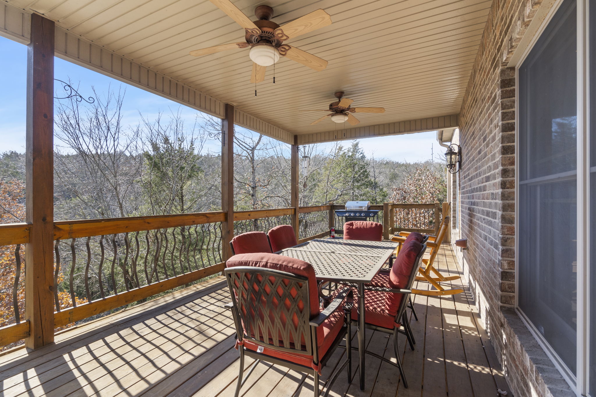 Main level deck with grill and outdoor seating