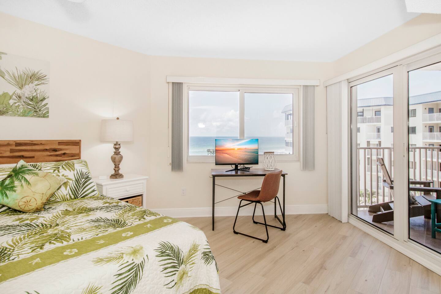 King size master bedroom with pool/gulf views and patio access. 