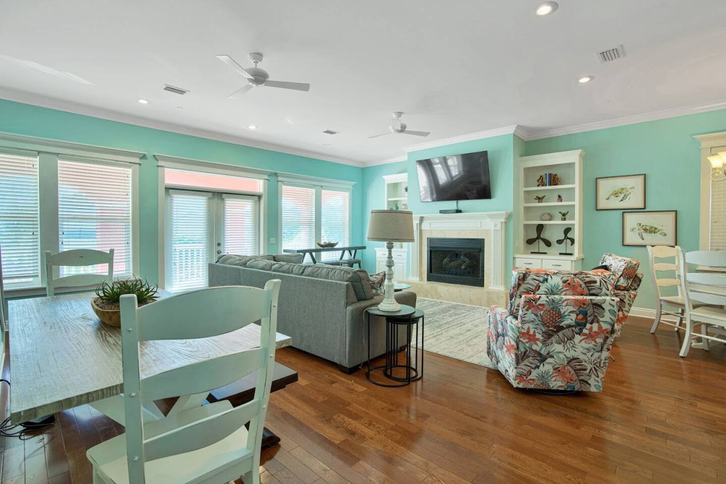 Second floor living and dining area with entrance to 2nd floor front porch with direct Gulf of Mexico views through French doors at rear.