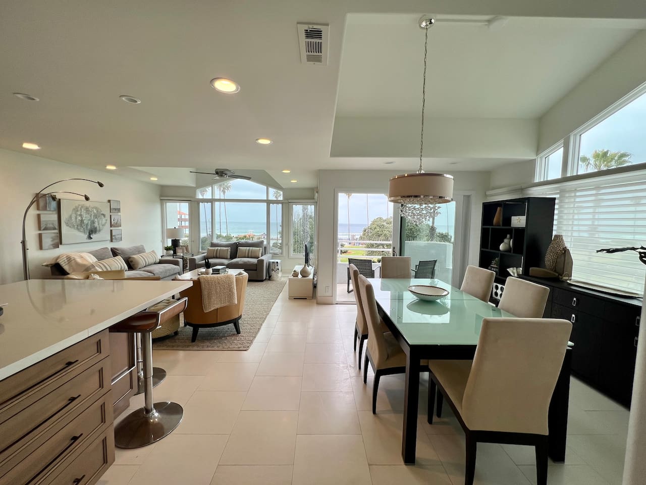 Dining and Living room with Balcony off of it. 