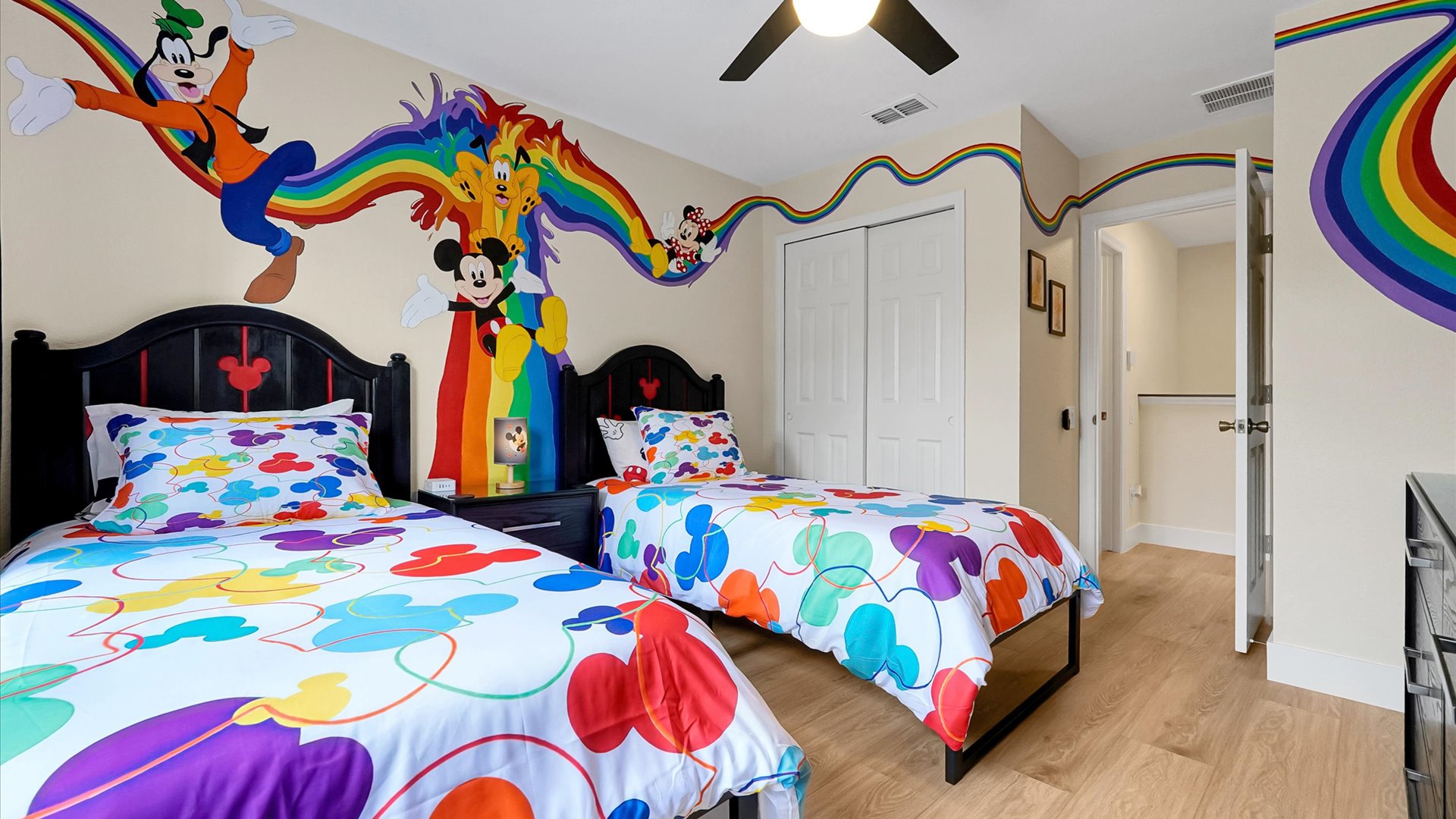 Mickey’s Rainbow Magic – Two twin beds and hand-painted wraparound mural