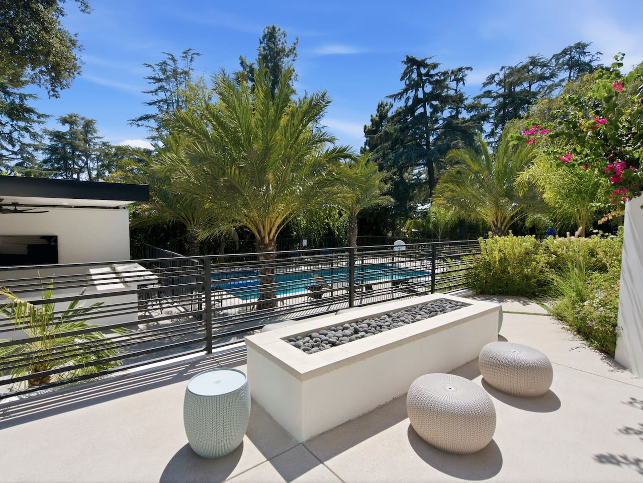 Everything you need for a relaxing day by the pool, all in one space.