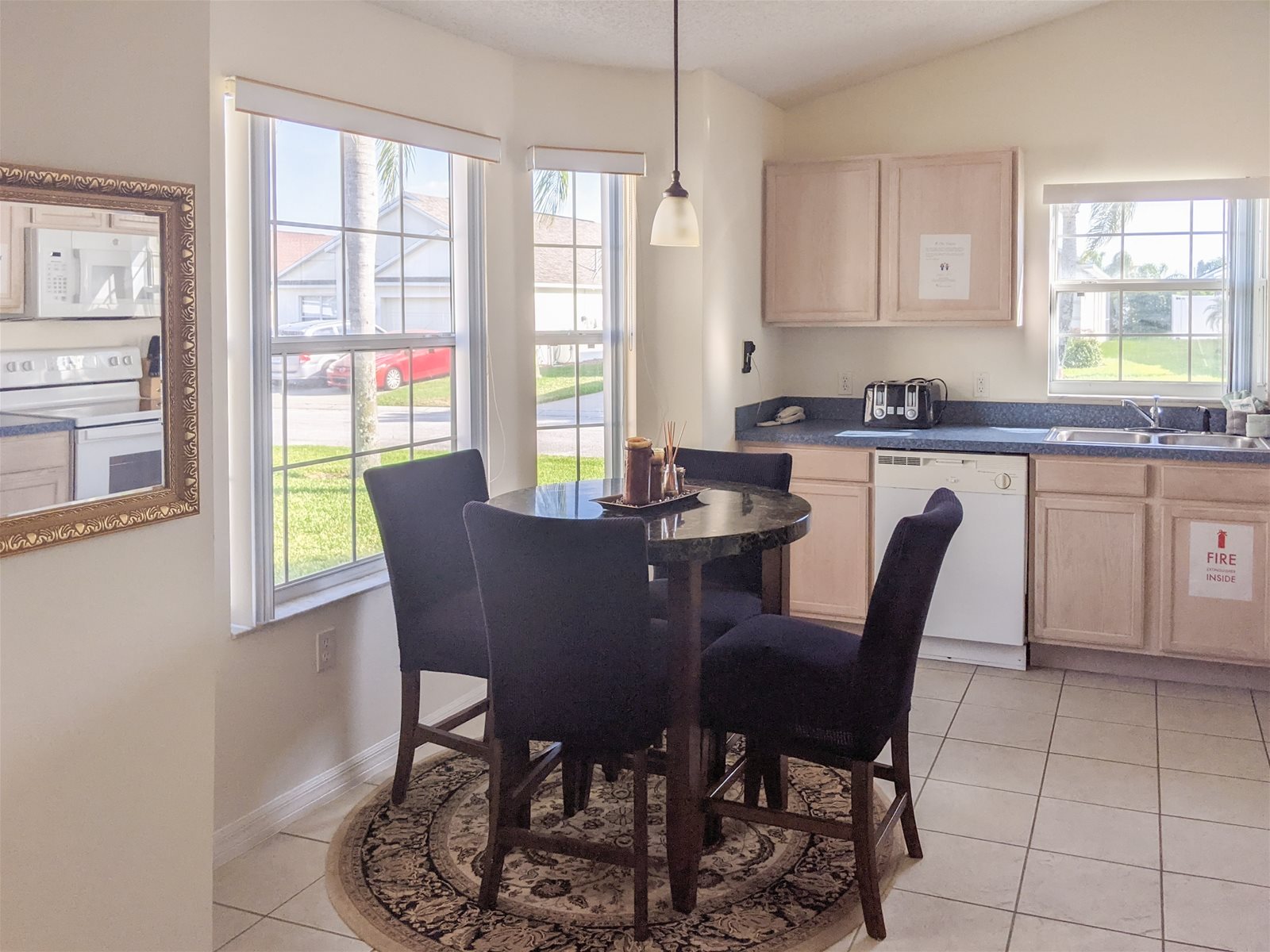 Fully stocked kitchen with a breakfast nook.