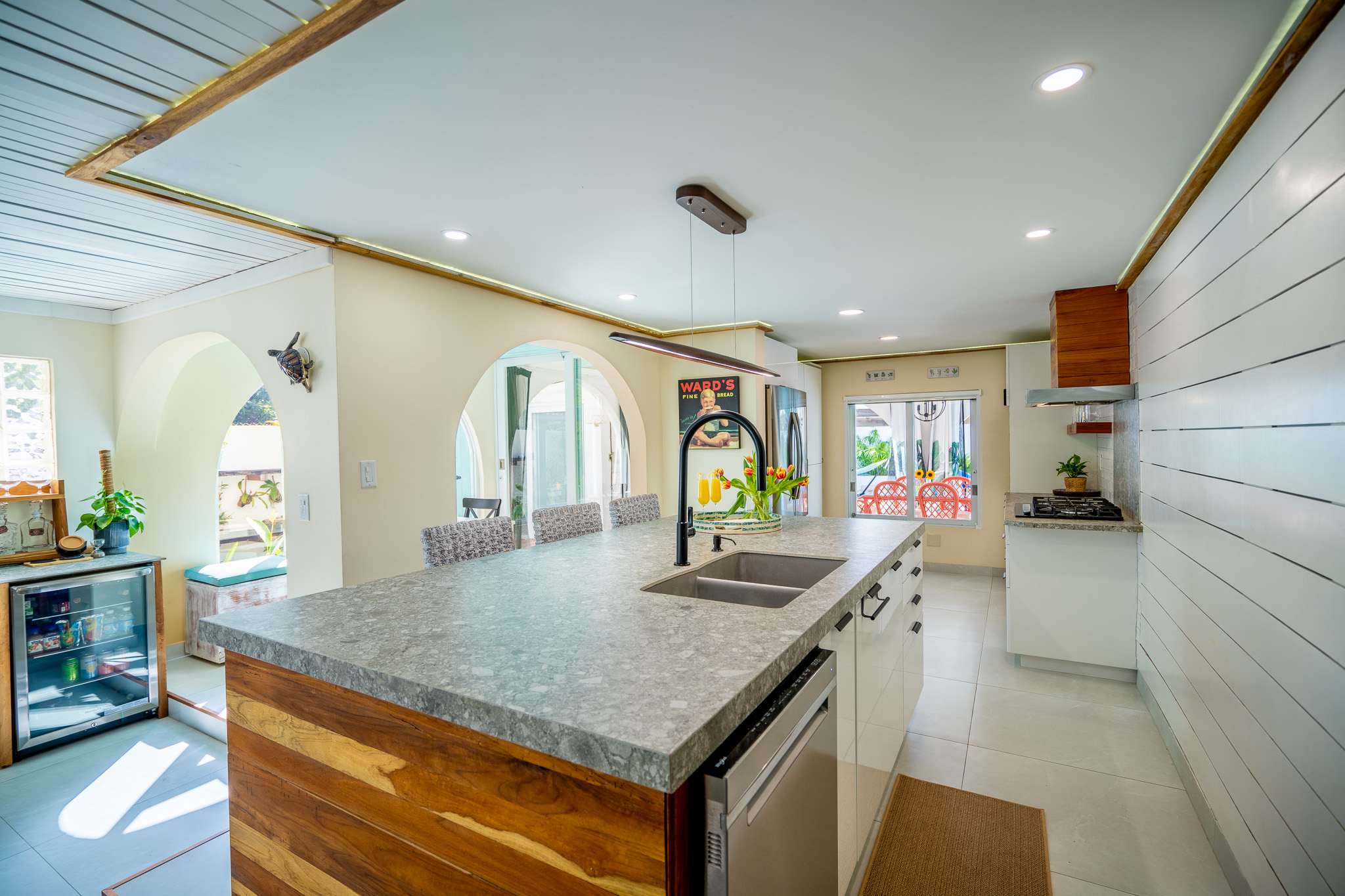 Here is another view of the Island in the kitchen with the breakfast nook off in the distance in Dorado, Puerto Rico.