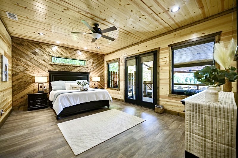 Wake up to serene pond views from your private King Suite—complete with soaking tub and walk-in shower