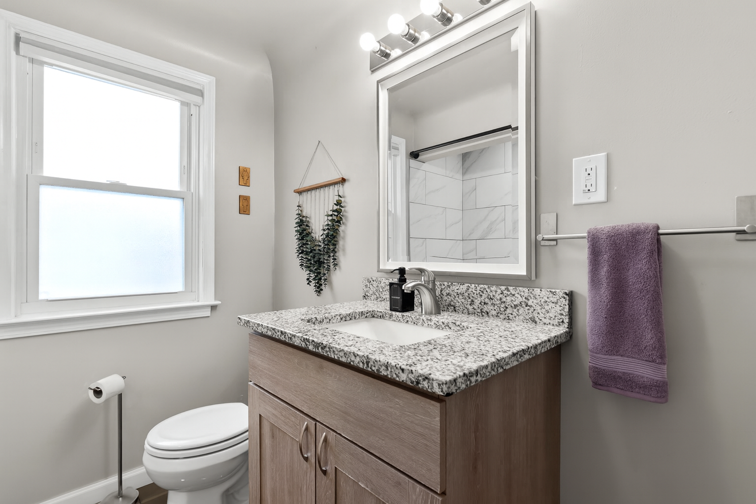 Granite counter tops provides extra storage for bathroom essentials