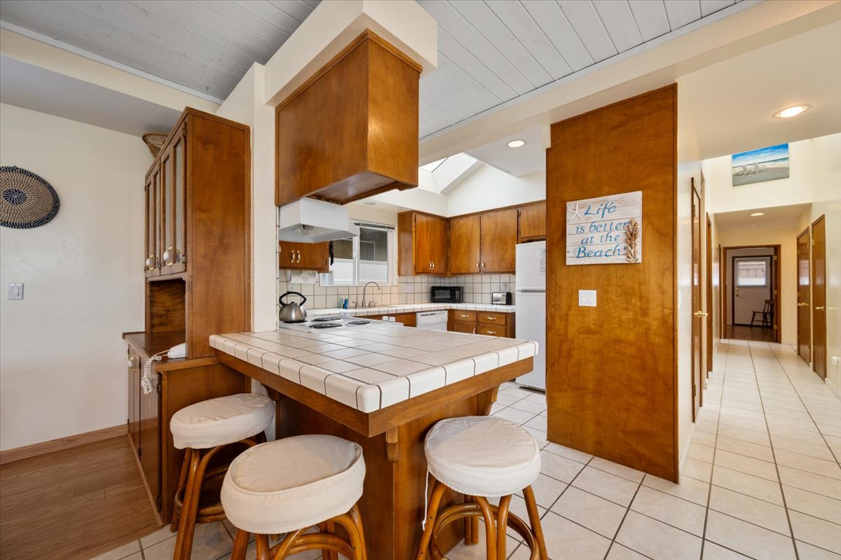 Bar seating off of Kitchen