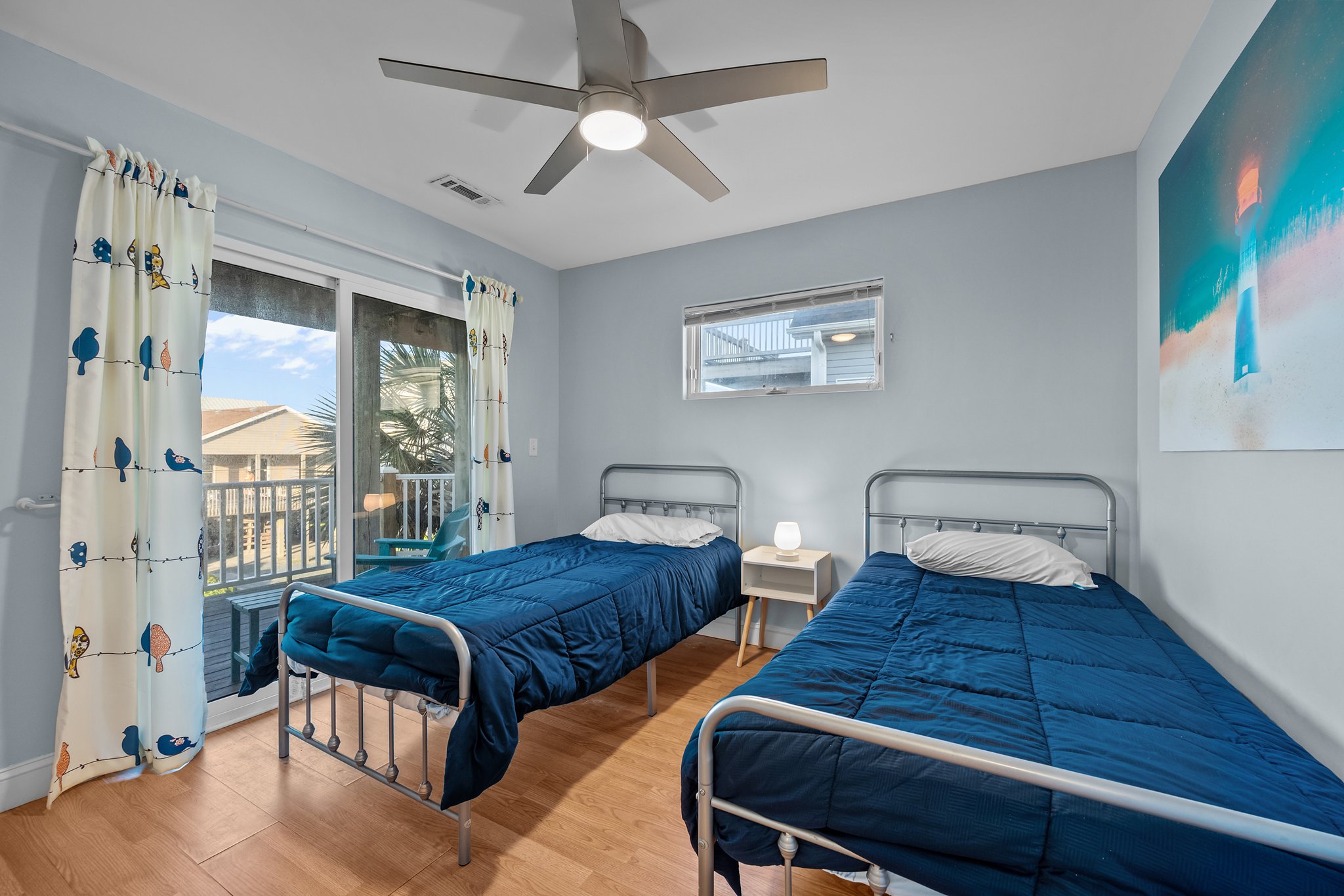 Perfect for kids, friends, or solo travelers — twin beds plus a balcony for fresh air
