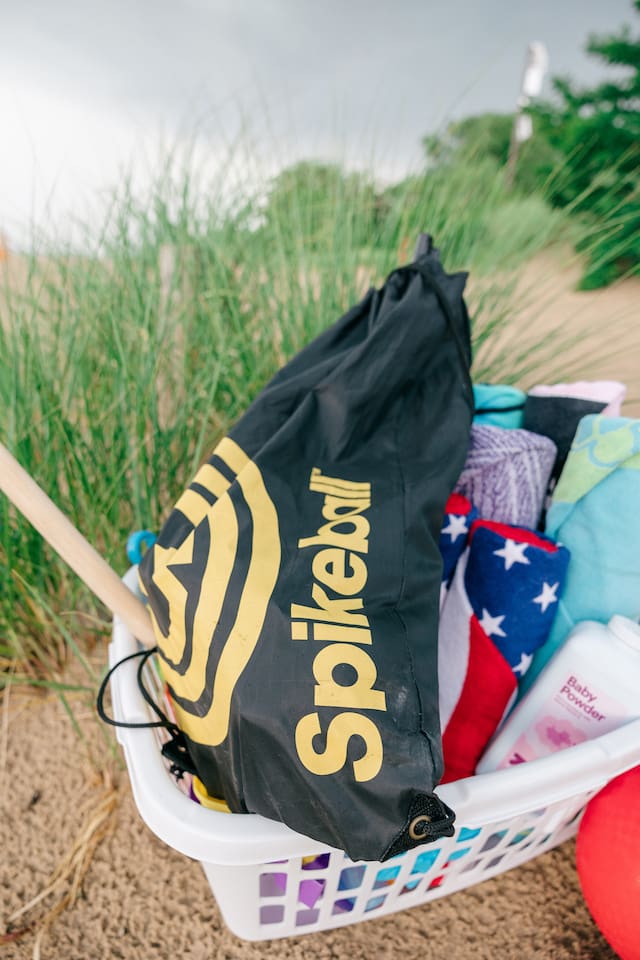 Fun for the whole family on the beach! We provide a beach basket full of towels, toys, and the new hot game, Spikeball. Be sure to grab it from the house to take to the Indiana Dunes National Park or local beach. 