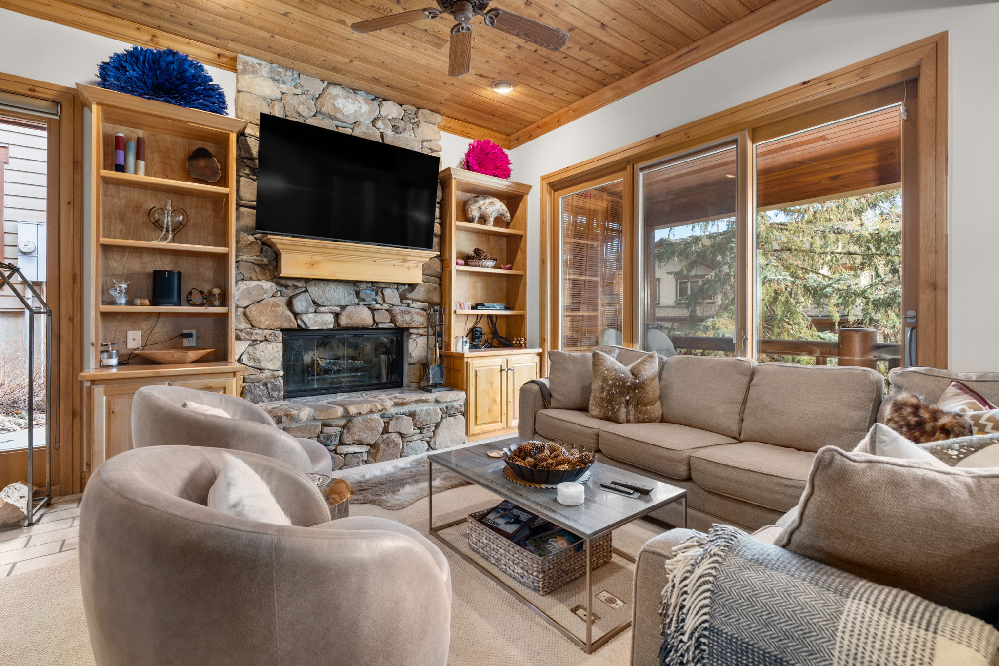 Beautifully appointed living room with real wood fire