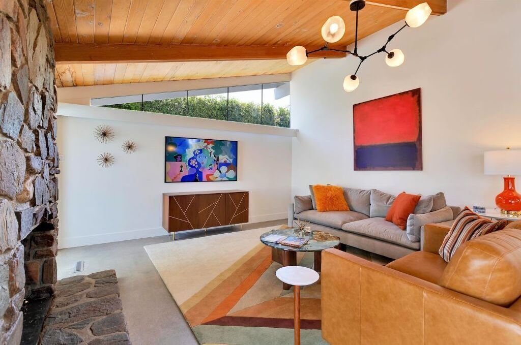 Great room with polished concrete floors and a gas fireplace