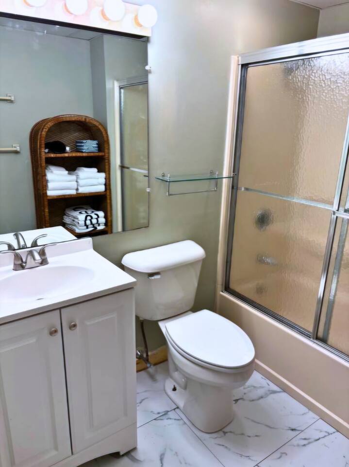 Bathroom located on first floor of this cozy lakeside cabin!