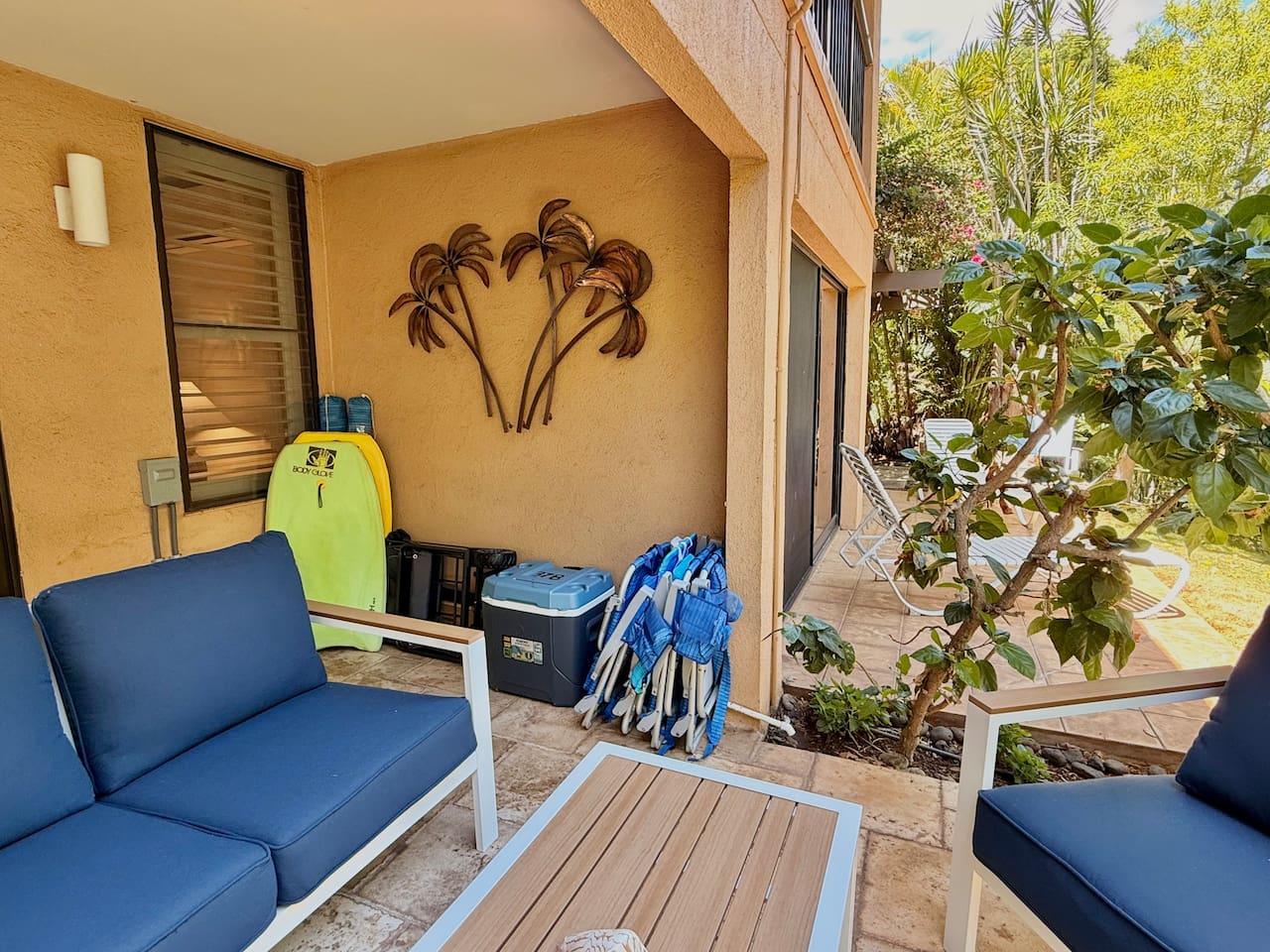 Outdoor couch and chairs, plus all the beach equipment you'll need including a cooler, cart, 4 beach chairs, boogie boards and umbrellas. You'll be ready to put your feet in the sand!